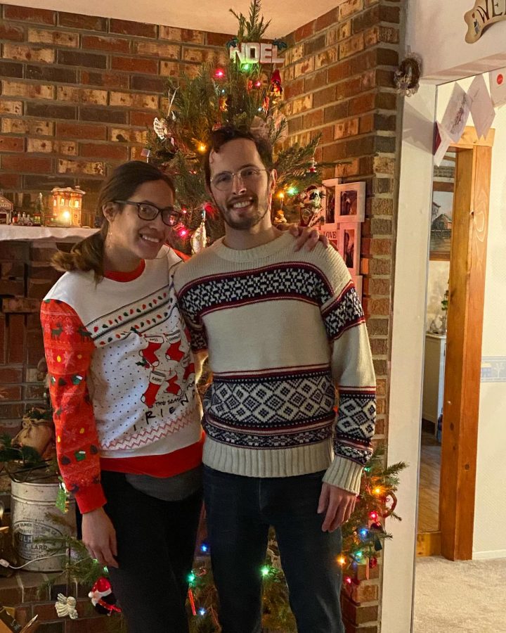 Mr. Burns and his girlfriend, Erlina, don holiday-themed sweaters