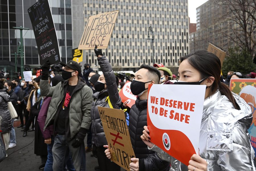 People protest in New Yorks Manhattan on Feb. 27, 2021, against a recent uptick in hate crimes targeting Asian Americans, apparently fueled by the news that COVID-19 first appeared in China. (Kyodo via AP Images) ==Kyodo