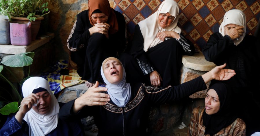 Palestinian+women+mourn+the+loss+of+relatives+on+May+12