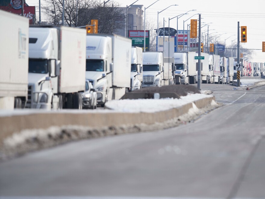 Truckers block traffic and shut down major thoroughfares between the U.S. and Canada