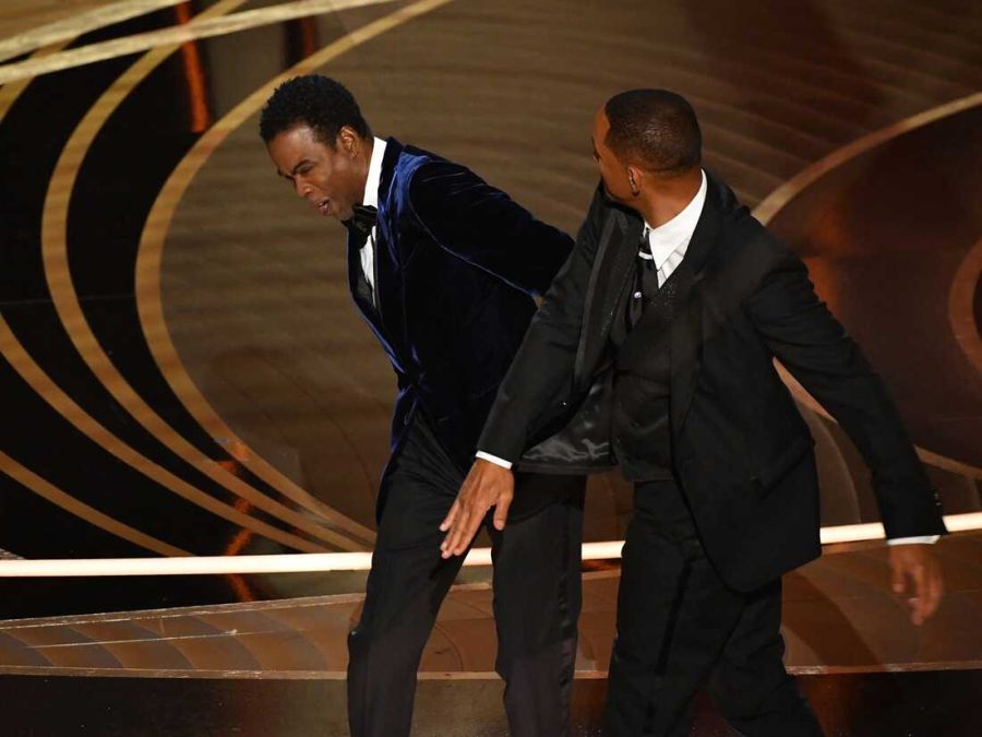 Actor Will Smith slaps comedian Chris Rock onstage during the Oscars on March 27.