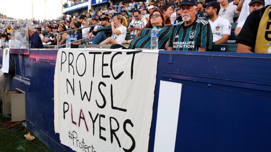  Signage supporting NWSL players is seen during a game in 2021