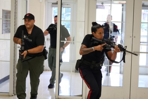 School resource officer Deborah Murillo works with Mt. Holly Police and Zero Eyes to conduct an active shooter drill in August