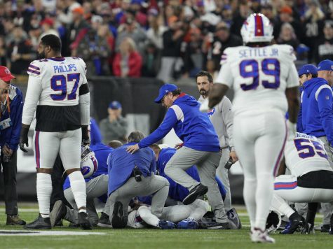 Buffalo Bills Damar Hamlin is examined after his collapse on the field against Cincinnati on January 2