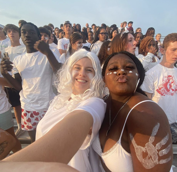 Clevenger with senior Miyah Dawson in the student section on September 9