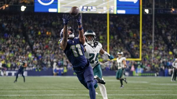 Seattle wide receiver Jaxon Smith-Njigba makes a catch in front of cornerback James Bradberry Monday night against the Seahawks