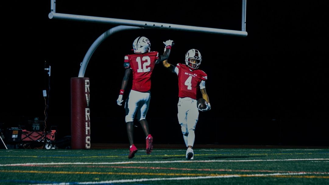 Devin Duana (#12) and Jameer Bellamy (#4) celebrate after scoring another touchdown